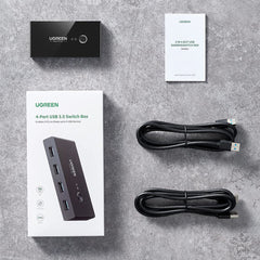 A Photo Of UGREEN USB 3.0 4-Port Switch – High-Speed Data Sharing Hub with LED Indicator & Touch Button