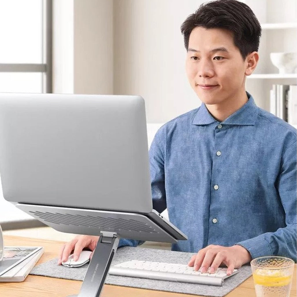 A Photo Of UGREEN Multi-Angle Adjustable Laptop Stand – Ergonomic & Portable Aluminum Riser for Laptops and Tablets