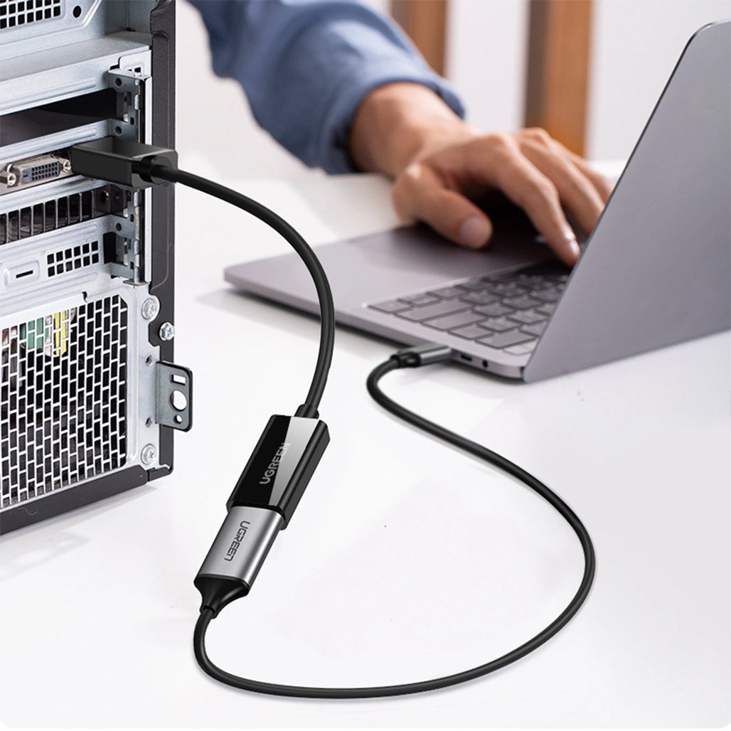 A Photo Of UGREEN DisplayPort to HDMI Adapter Cable (Male to Female) – 4K@30Hz, Unidirectional, 25cm, Black