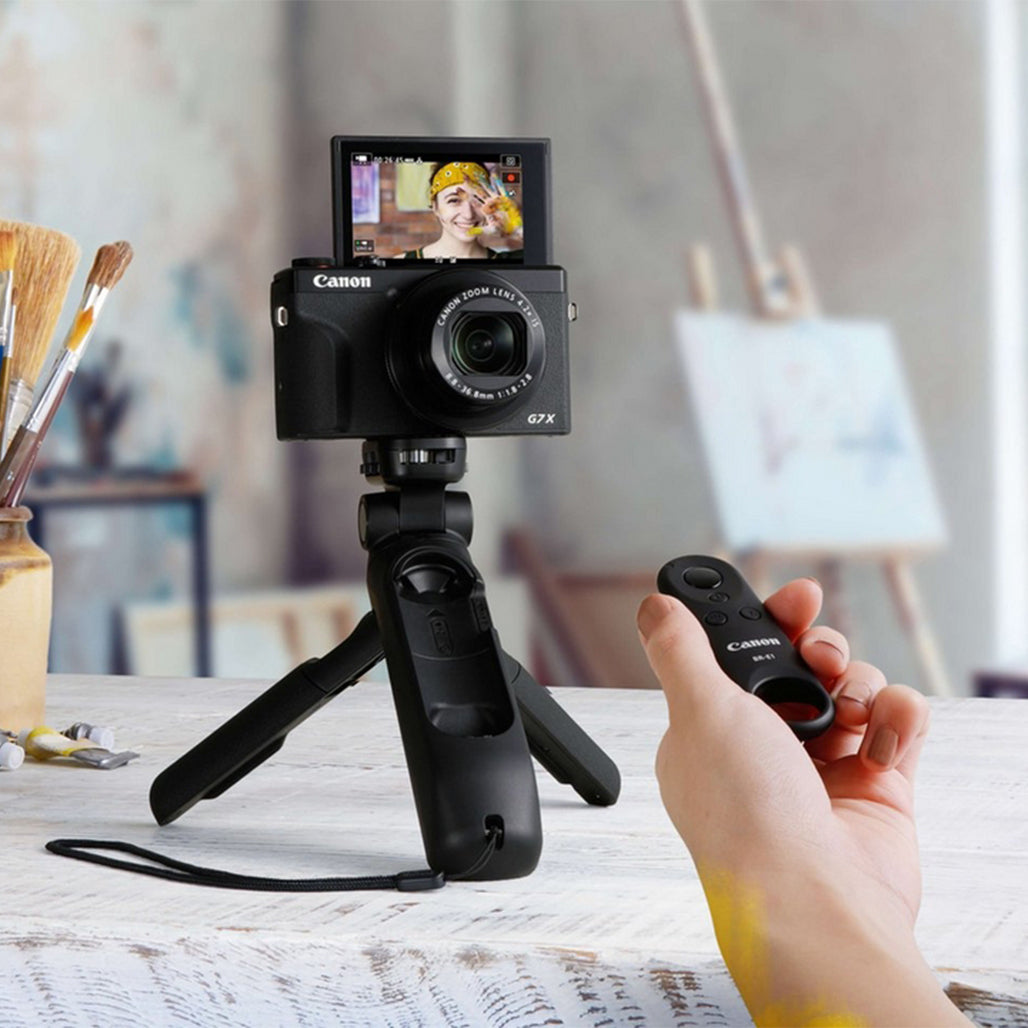 A Photo Of Canon HG-100TBR Tripod Grip with Bluetooth Remote – Compact Vlogging Tripod for Canon Cameras