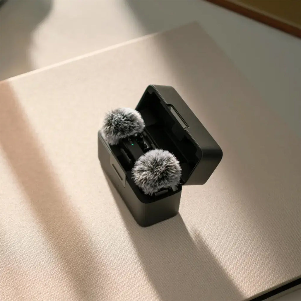 A Photo Of DJI Mic Mini (2 TX + 1 RX + Charging Case) - Compact Wireless Microphone