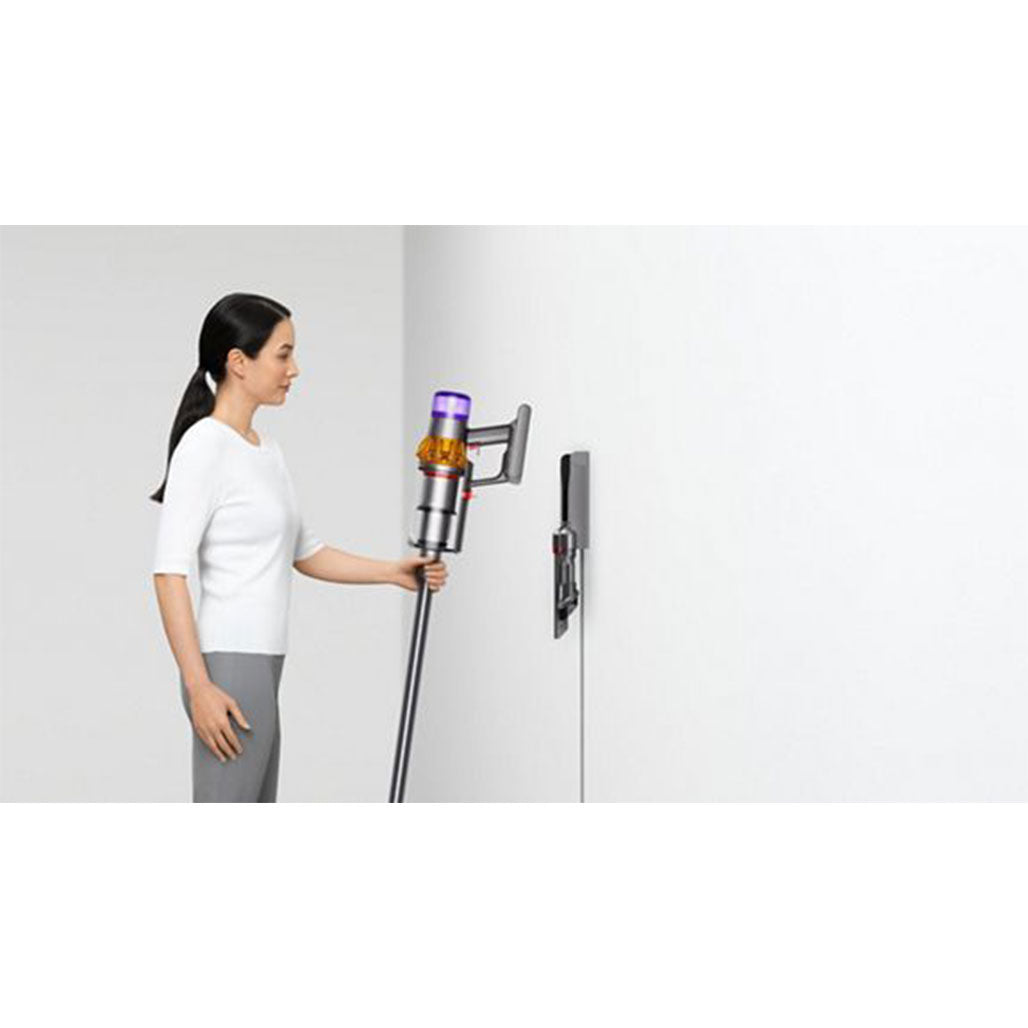 A Photo Of Dyson V15 Detect, Dyson’s most powerful, most intelligent cordless vacuum. With laser illumination.