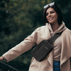 A Photo Of Porodo Crossbody Bag - Black | Water-Resistant, PD 40W Fast Charging, Adjustable Strap & Secure Storage