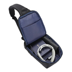 A Photo Of Porodo Crossbody Bag - Black | Water-Resistant, PD 40W Fast Charging, Adjustable Strap & Secure Storage