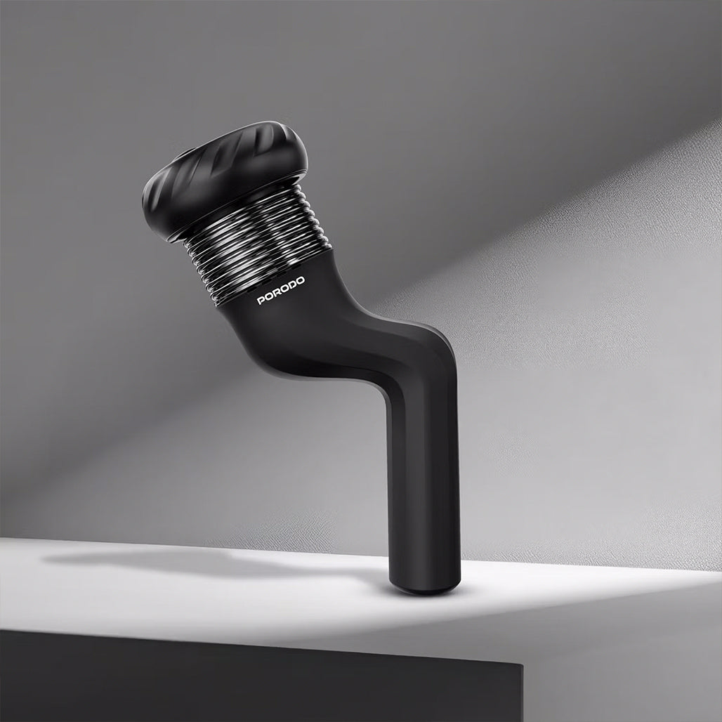 A Photo Of Porodo Lifestyle Portable Handheld Multi-Speed Rotating massager with 4 heads- Black