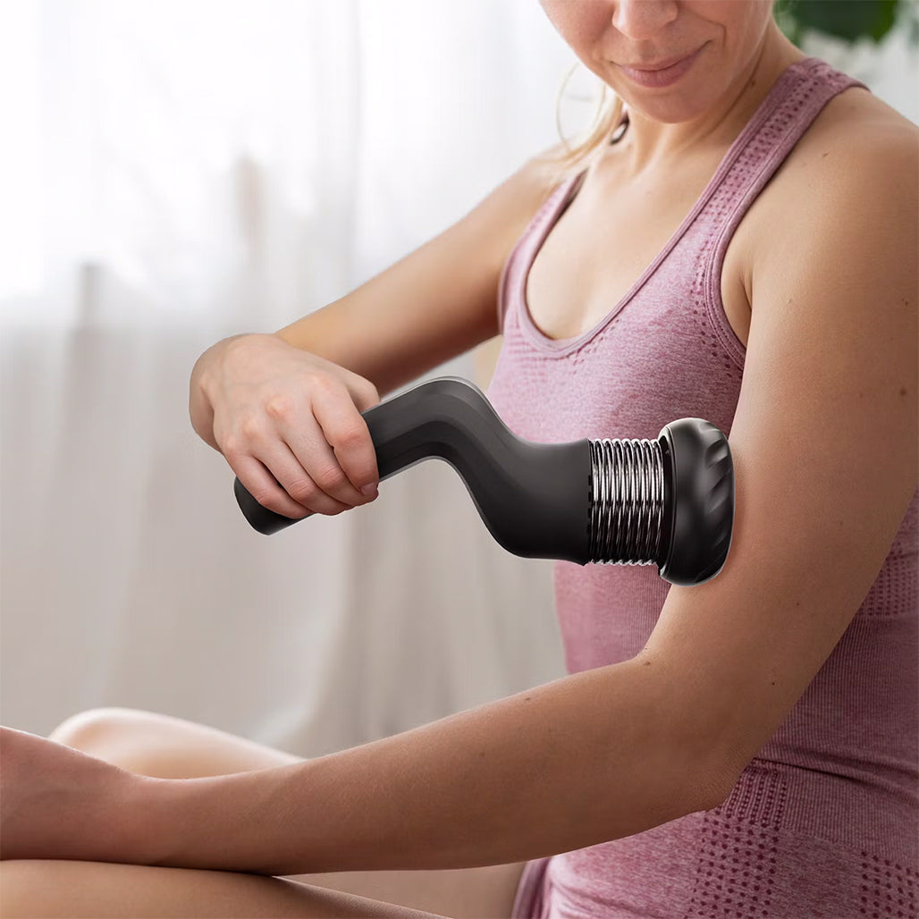 A Photo Of Porodo Lifestyle Portable Handheld Multi-Speed Rotating massager with 4 heads- Black