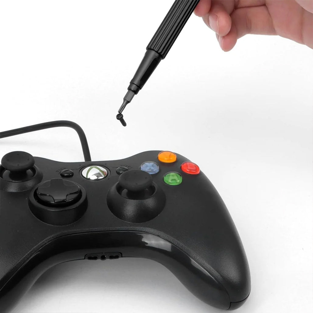 A Photo Of Pen Type Screwdriver 13 IN 1 - Compact, Portable, and Magnetic Black Tool Set