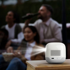 A Photo Of Powerology Mini Beam Portable Projector - White