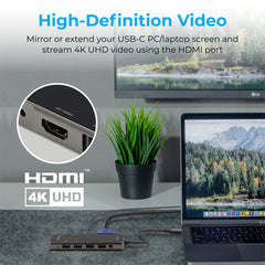 A Photo Of Promate PrimeHub-Pro Ultra-Fast Multiport USB-C Hub with 100W Power Delivery, 4K HDMI, VGA, Ethernet, USB Ports, SD/TF Card Reader