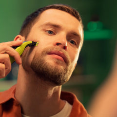 A Photo Of Philips OneBlade Face + Body QP2824/10 Hybrid Trimmer | Waterproof Electric Razor with Dual Blades & Skin Guard