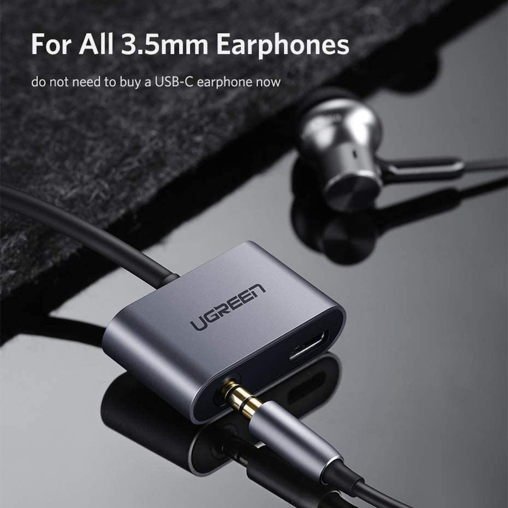 A Photo Of UGreen 2-Port USB-C Hub with 3.5mm Audio Jack | Type-C Adapter for Charging and Listening Simultaneously | 50596