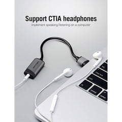 A Photo Of Vention 3.5mm External Sound Card VT02-2016 | USB Audio Adapter with Microphone and Audio Output Support