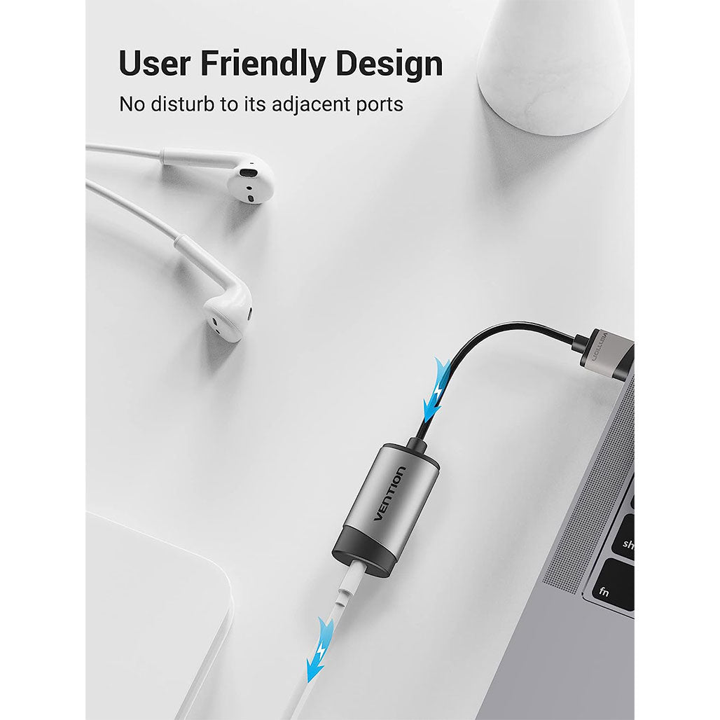 A Photo Of Vention 3.5mm External Sound Card VT02-2016 | USB Audio Adapter with Microphone and Audio Output Support