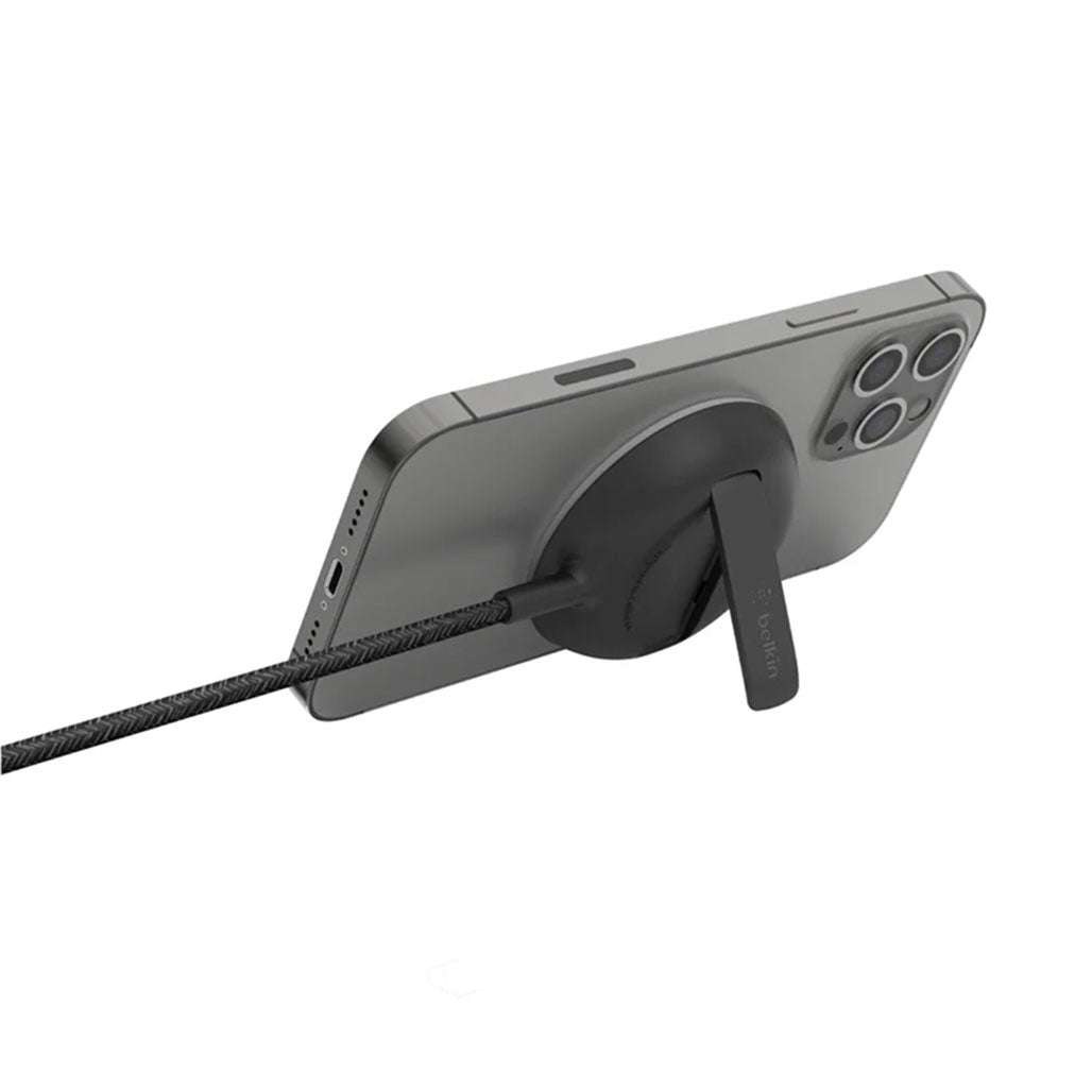 A Photo Of Belkin WIA004BTBK MagSafe Portable Wireless Charger Pad with Stand - 15W Fast Charging, 6.6ft Cable, Compatible with iPhone 13/12, Black