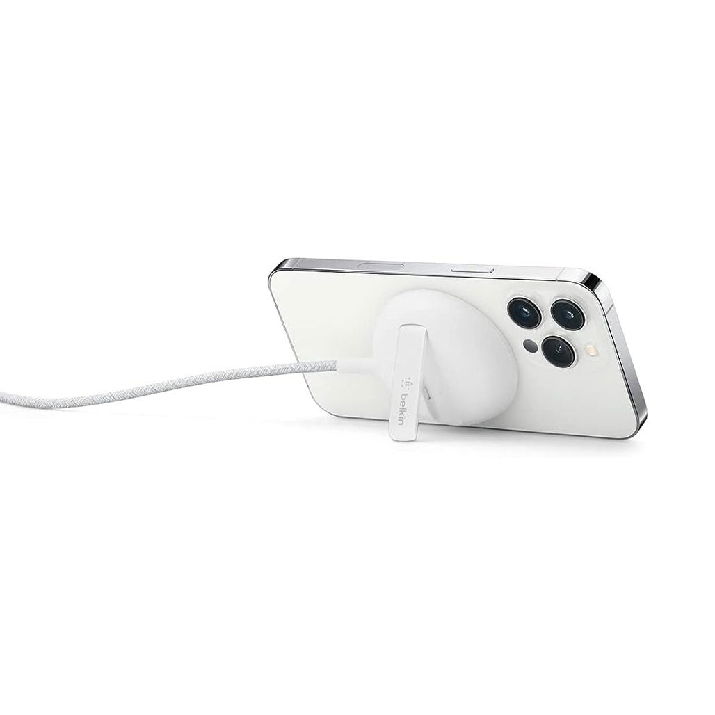 A Photo Of Belkin WIA004BTWH MagSafe Portable Wireless Charger Pad with Stand - 15W Fast Charging, 6.6ft Cable, Compatible with iPhone 13/12, White