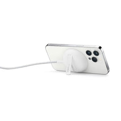 A Photo Of Belkin WIA004BTWH MagSafe Portable Wireless Charger Pad with Stand - 15W Fast Charging, 6.6ft Cable, Compatible with iPhone 13/12, White