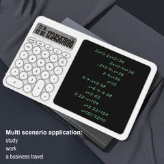 A Photo Of Calculator Writing Tablet For Office and Study