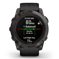 A Photo Of Garmin Fēnix® 7X Pro Sapphire Solar Edition - Titanium with Fog Gray/Ember Orange Band