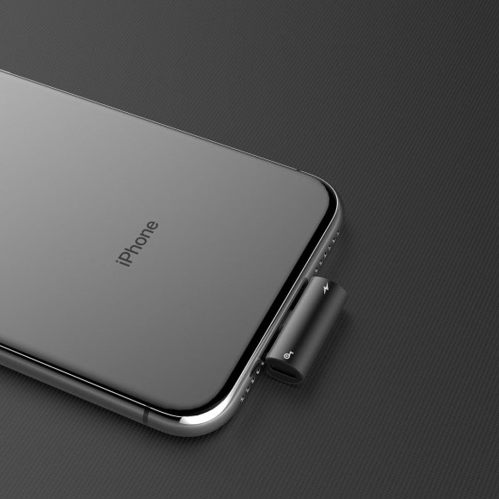 A Photo Of Baseus L46 iP Male to Dual iP Female Adapter - Charging, Music, and Calling Support