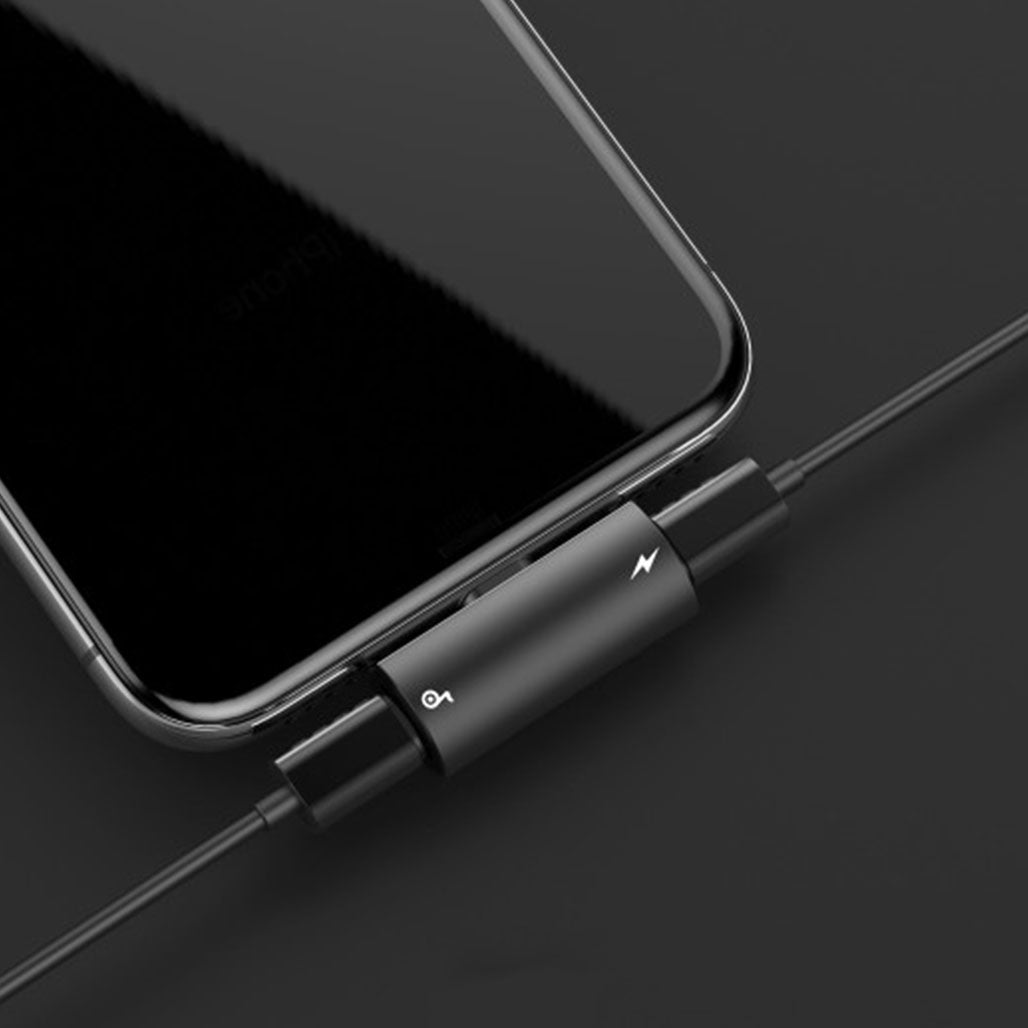 A Photo Of Baseus L46 iP Male to Dual iP Female Adapter - Charging, Music, and Calling Support