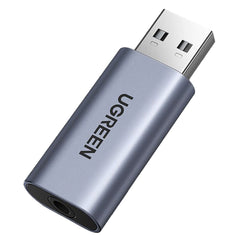 A Photo Of UGreen USB 2.0 to 3.5mm Audio Adapter – Stereo Sound for PC, Gaming Consoles, and More