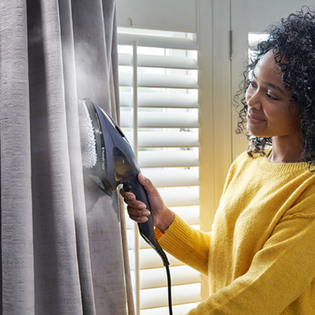 A Photo Of Russell Hobbs Steam Genie 2-in-1 – Handheld Steamer and Iron