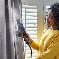 A Photo Of Russell Hobbs Steam Genie 2-in-1 – Handheld Steamer and Iron