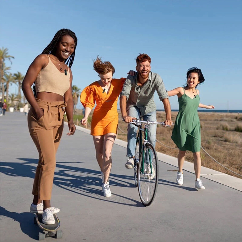 A Photo Of BOYA BY-V4U 4-Channel Wireless Microphone System – Noise-Canceling Lavalier Mic for iOS, USB-C, and 3.5mm Devices