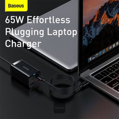 A Photo Of Baseus 65W GaN3 Pro USB Charger PD Fast Charger Adaptor Desktop