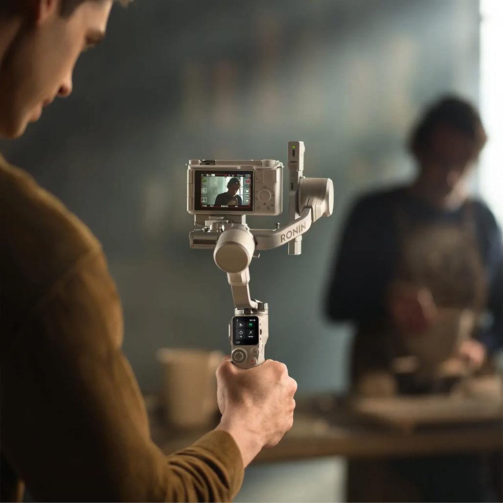 A Photo Of DJI RS 4 Mini Combo – Lightweight Camera Gimbal with Automated Axis Locks & Vertical Shooting