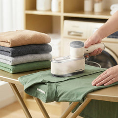 A Photo Of Green Lion 3-in-1 Steam Iron, Garment Steamer & Lint Remover