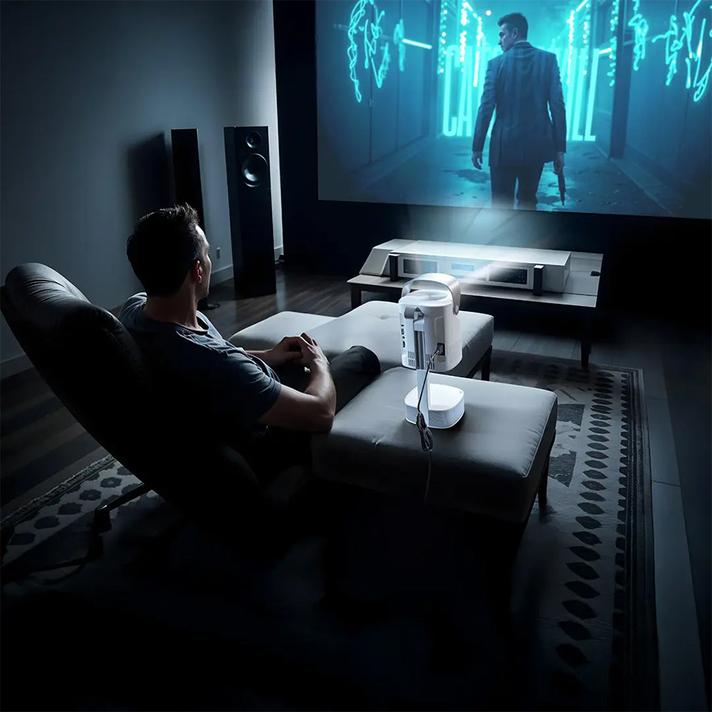 A Photo Of Green Lion Pluto 4K Portable Projector – Home & Outdoor Cinema Experience