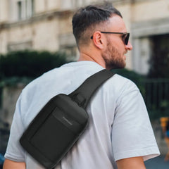 A Photo Of Porodo Crossbody Bag - Black | Water-Resistant, PD 40W Fast Charging, Adjustable Strap & Secure Storage
