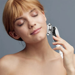 A Photo Of Porodo 7-In-1 LED Microcurrent Facial Massager with Warm Vibration & Serum Infusion