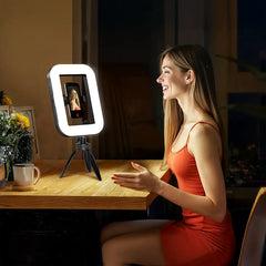 A Photo Of Porodo Lifestyle Handheld Ring Grip Camera & phone vlogging light with Desktop support & Phone clamp - Black