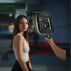 A Photo Of Porodo Lifestyle Handheld Ring Grip Camera & phone vlogging light with Desktop support & Phone clamp - Black