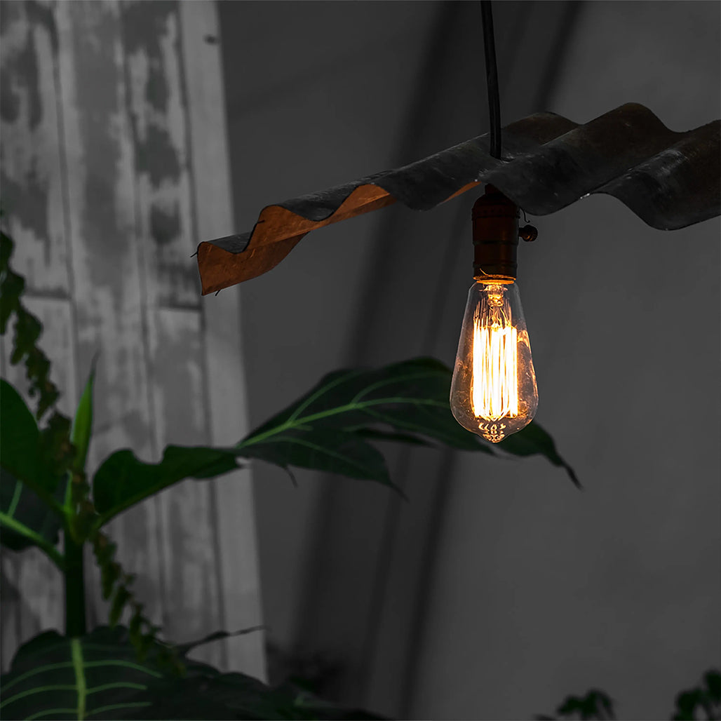 A Photo Of Tellur WiFi Smart Filament Bulb E27 6W Amber
