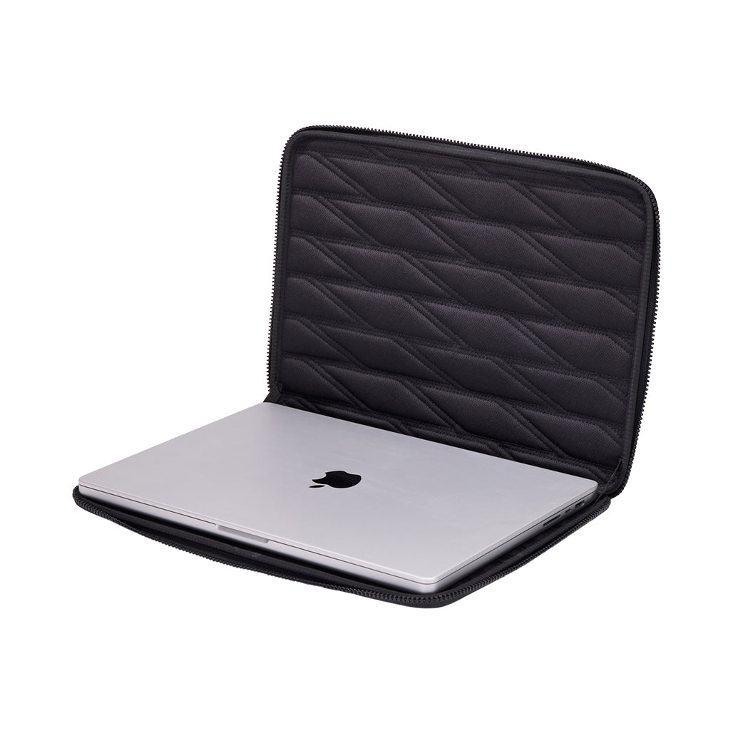 A Photo Of Thule Gauntlet sleeve for MacBook Pro 14