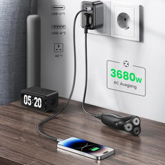 A Photo Of UGREEN 90613 30W Outlet Extender Charger – 4-in-1 Fast Charging Adapter with USB-C & USB-A Ports