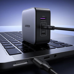 A Photo Of UGREEN 65W USB-C 3-Port International Adapter with EU UK US Plugs