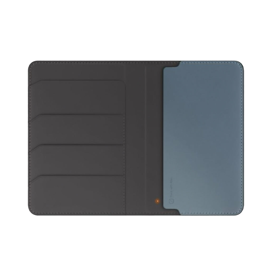 A Photo Of UNIQ Belmont Vegan Leather Passport Holder with Apple Find My Tracker & RFID Protection