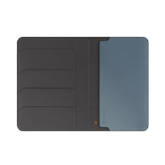 A Photo Of UNIQ Belmont Vegan Leather Passport Holder with Apple Find My Tracker & RFID Protection