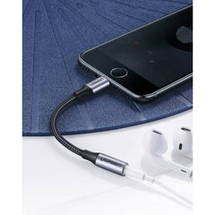 A Photo Of Ugreen 3.5mm Jack to Lightning Headphone Adapter – MFi Certified (10cm)