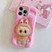 A Small Photo Of Labubu Shockproof Silicone Case with Stand for iPhone 16 Pro's Color Variant