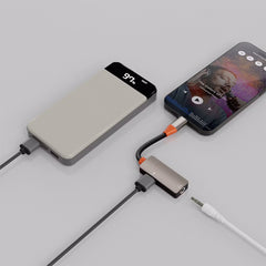 A Photo Of Porodo AudioLink Duo Lightning & 3.5mm Jack Splitter