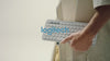 A Video Of Logitech 920-011852 Pebble Keys 2 K380S - White - Wireless Keyboard
